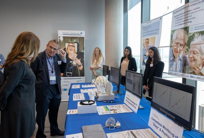 Prof Derk-Jan Dijk showing Gillian Keegan MP sleep technology devices