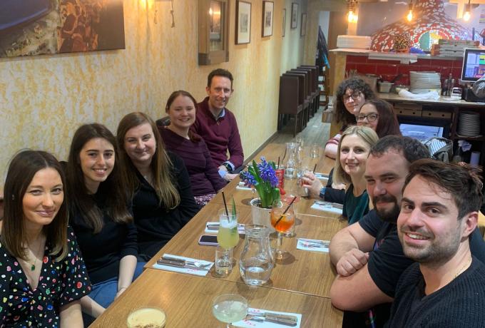 A lab group sitting in a restaurant