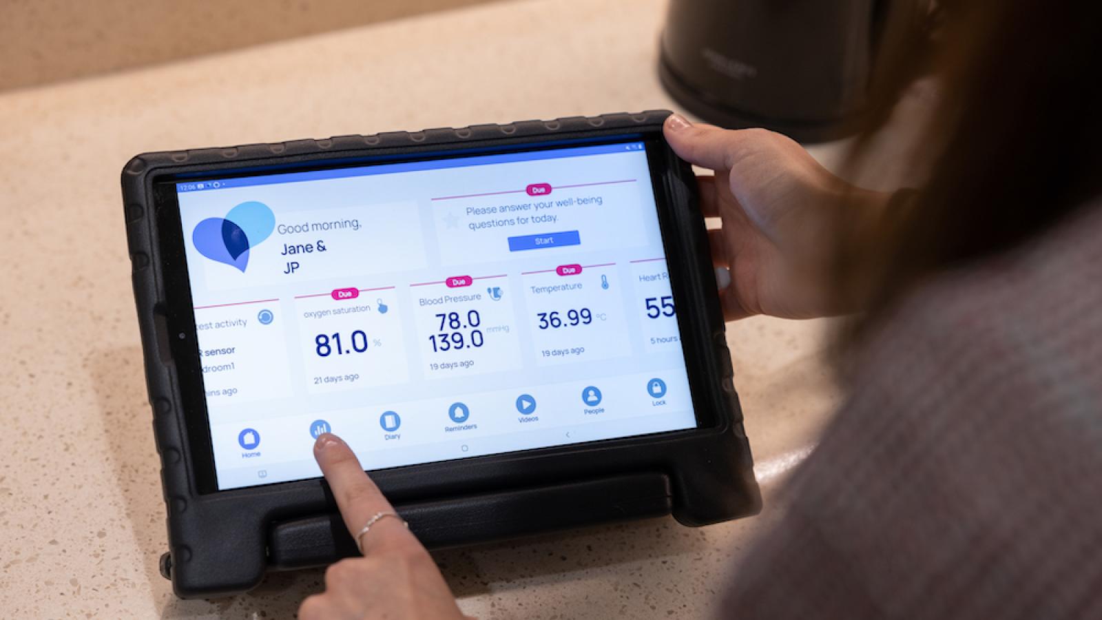 Minder app interface shown on a tablet