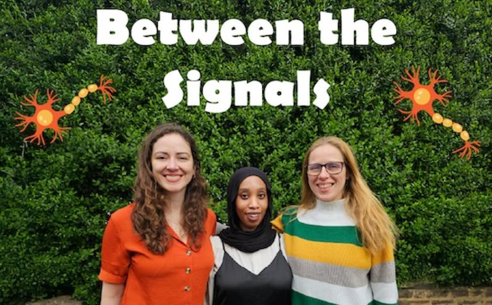 Podcast hosts and guests stood outside