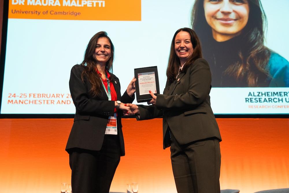 Maura receiving her award